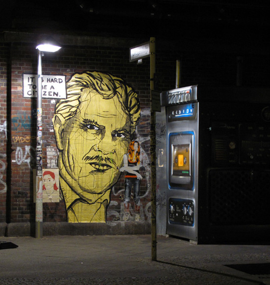 Yellow head graffiti in Berlin.