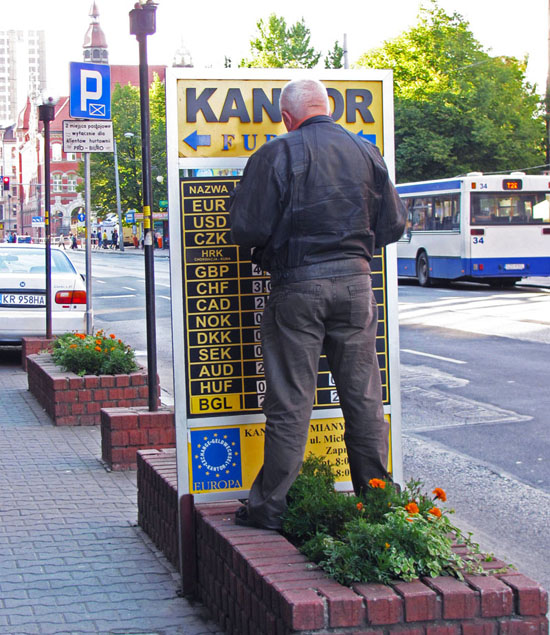A man fixing exchange rates in Katowice.