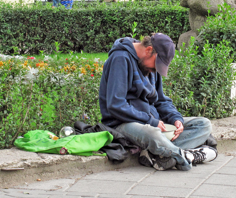 A begging man in Bydgoszcz.