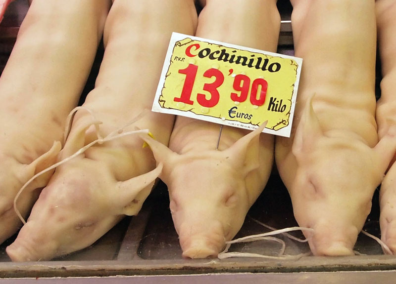 Dead pigs in Mercado de la Cebada, Madrid.