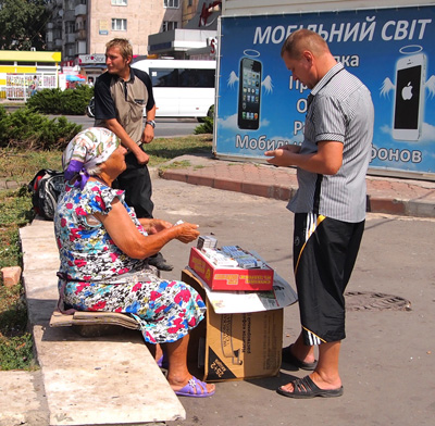 An old woman selling sigarettes in Kryvyi Rih.
